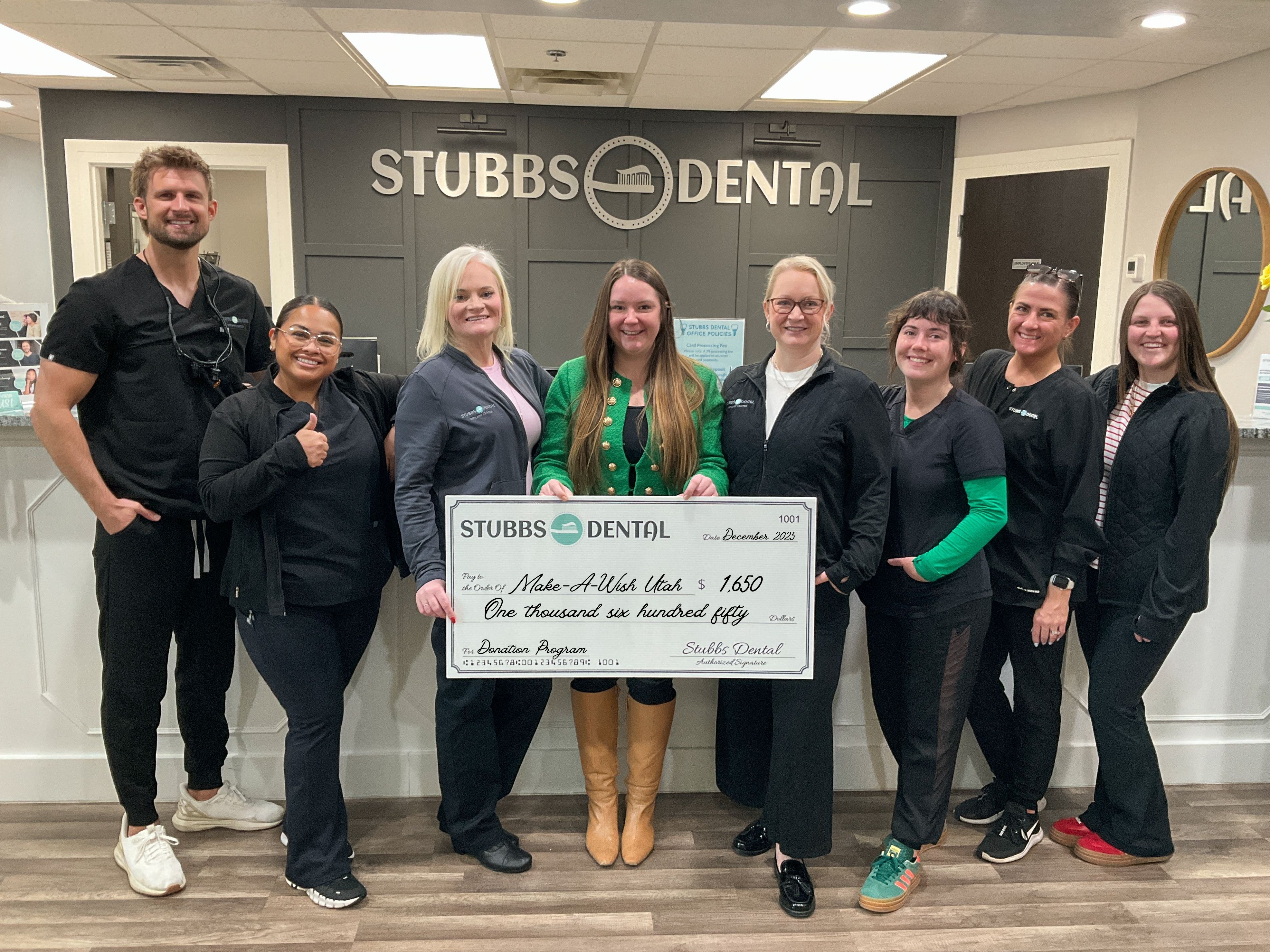 Make-A-Wish Utah receiving donation at Stubbs Dental Implant Center