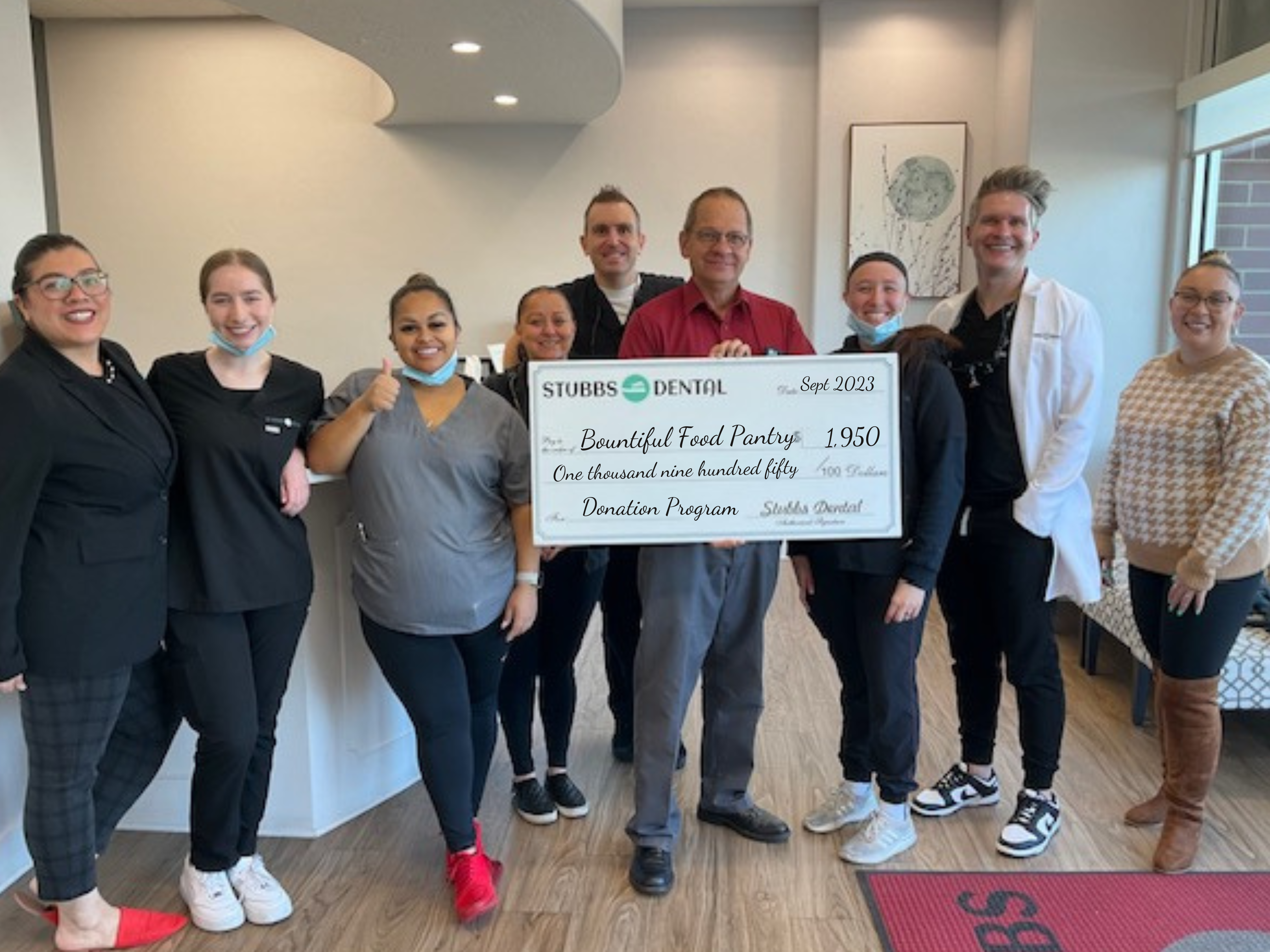 Stubbs Dental Implant Center Donates to Bountiful Food Pantry